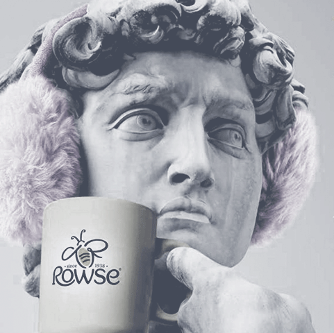 Michelangelo's David wearing fluffy headphones and holding a mug